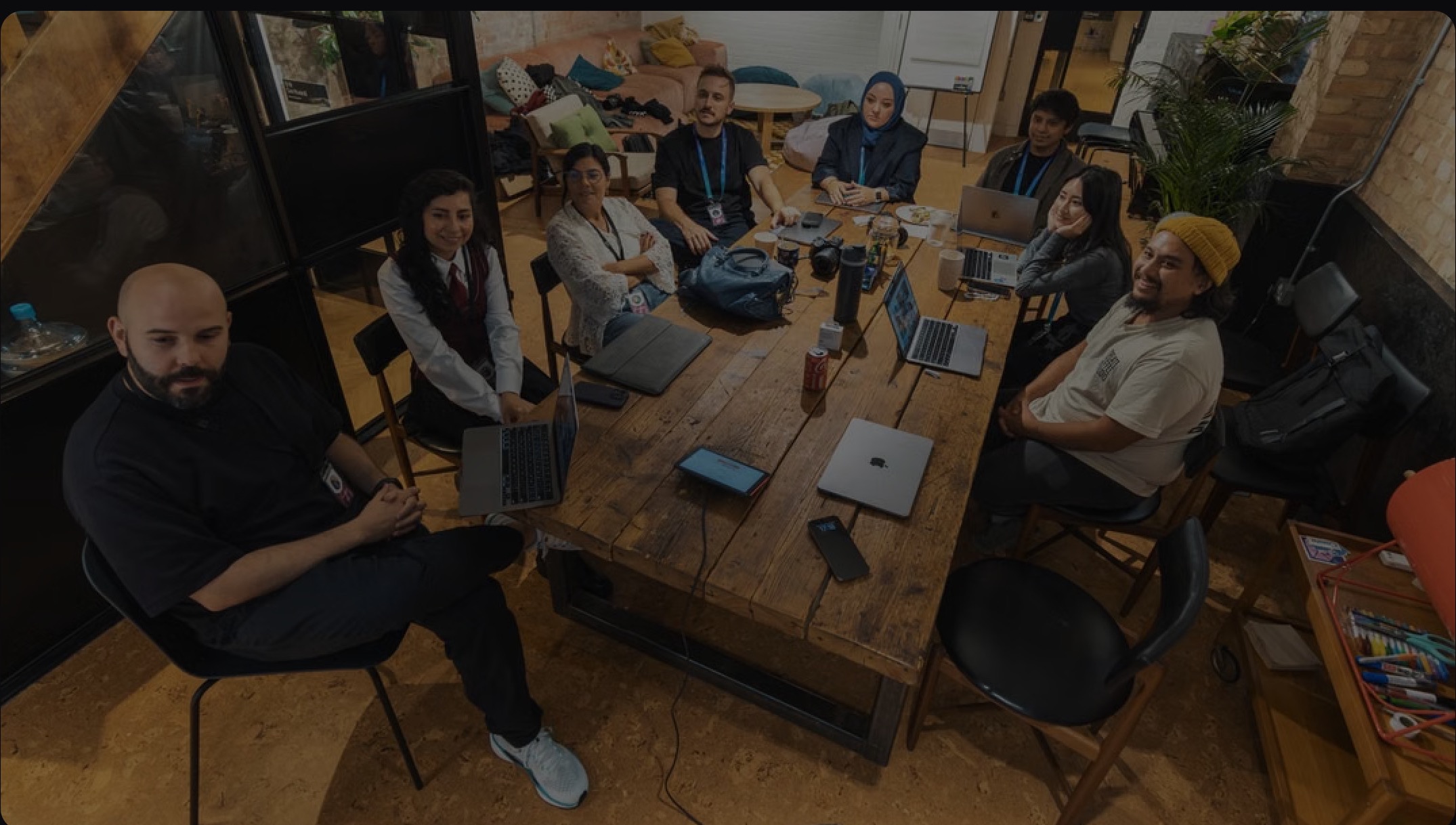 The MZR Group team gathered around a table
